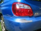 Subaru WRX showing the process from filling, masking and painting, to final precise polish -SydneyMobilePaintRepair.com.au