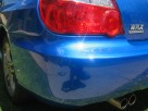 Subaru WRX showing the process  from filling, masking and painting, to final precise polish -SydneyMobilePaintRepair.com.au
